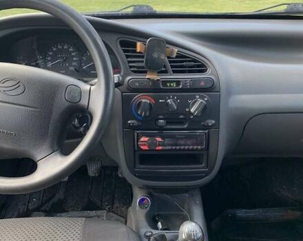 Красный ЗАЗ Ланос, объемом двигателя 1.5 л и пробегом 89 тыс. км за 3300 $, фото 6 на Automoto.ua