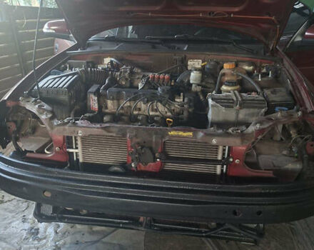 Красный ЗАЗ Ланос, объемом двигателя 1.5 л и пробегом 110 тыс. км за 4250 $, фото 30 на Automoto.ua