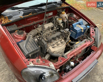 Красный ЗАЗ Ланос, объемом двигателя 1.5 л и пробегом 370 тыс. км за 2550 $, фото 12 на Automoto.ua