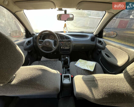 Красный ЗАЗ Ланос, объемом двигателя 1.39 л и пробегом 227 тыс. км за 1600 $, фото 14 на Automoto.ua