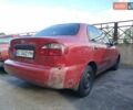 Красный ЗАЗ Ланос, объемом двигателя 1.39 л и пробегом 320 тыс. км за 1250 $, фото 1 на Automoto.ua