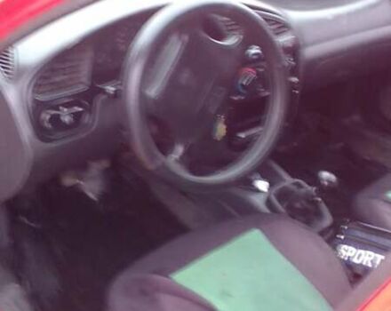 Красный ЗАЗ Ланос, объемом двигателя 1.3 л и пробегом 200 тыс. км за 1900 $, фото 3 на Automoto.ua