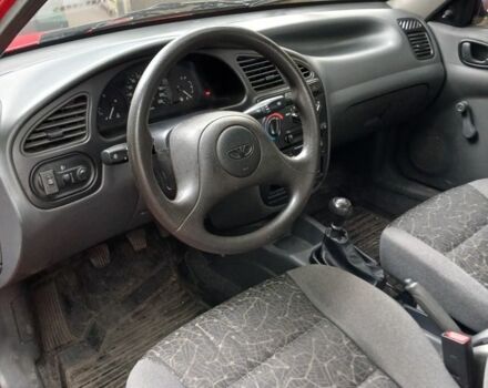 Красный ЗАЗ Ланос, объемом двигателя 1.4 л и пробегом 65 тыс. км за 3700 $, фото 4 на Automoto.ua