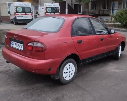 Красный ЗАЗ Ланос, объемом двигателя 1.4 л и пробегом 198 тыс. км за 1750 $, фото 1 на Automoto.ua