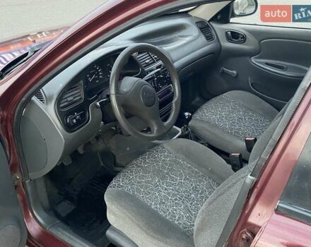 Червоний ЗАЗ Ланос, об'ємом двигуна 1.39 л та пробігом 226 тис. км за 2200 $, фото 11 на Automoto.ua