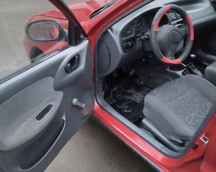 Красный ЗАЗ Ланос, объемом двигателя 1.4 л и пробегом 198 тыс. км за 1750 $, фото 7 на Automoto.ua