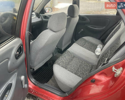 Красный ЗАЗ Ланос, объемом двигателя 1.39 л и пробегом 180 тыс. км за 1750 $, фото 8 на Automoto.ua