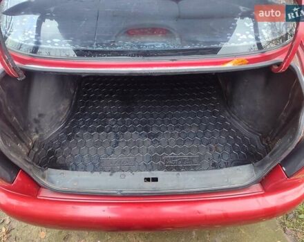 Красный ЗАЗ Ланос, объемом двигателя 1.39 л и пробегом 254 тыс. км за 1500 $, фото 11 на Automoto.ua