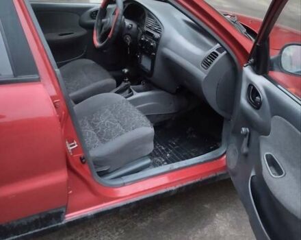 Красный ЗАЗ Ланос, объемом двигателя 1.4 л и пробегом 198 тыс. км за 1750 $, фото 8 на Automoto.ua