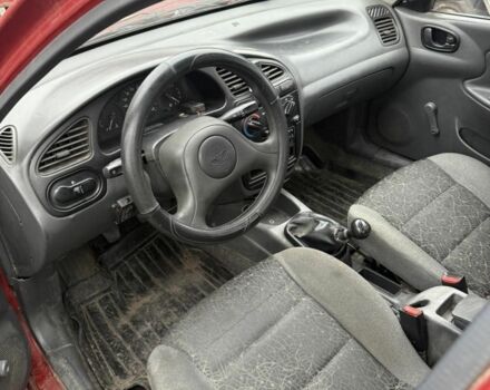 Красный ЗАЗ Ланос, объемом двигателя 1.4 л и пробегом 270 тыс. км за 1150 $, фото 7 на Automoto.ua