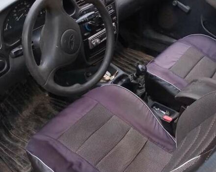 Красный ЗАЗ Ланос, объемом двигателя 1.4 л и пробегом 180 тыс. км за 2450 $, фото 4 на Automoto.ua