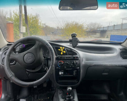 Красный ЗАЗ Ланос, объемом двигателя 1.39 л и пробегом 180 тыс. км за 1750 $, фото 9 на Automoto.ua