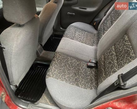 Красный ЗАЗ Ланос, объемом двигателя 1.5 л и пробегом 200 тыс. км за 1950 $, фото 14 на Automoto.ua