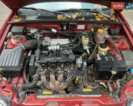 Красный ЗАЗ Ланос, объемом двигателя 1.5 л и пробегом 200 тыс. км за 1950 $, фото 18 на Automoto.ua