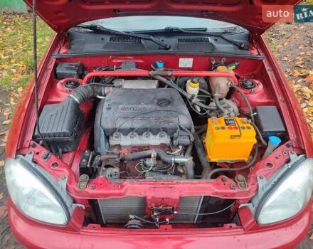 Красный ЗАЗ Ланос, объемом двигателя 1.39 л и пробегом 254 тыс. км за 1500 $, фото 10 на Automoto.ua