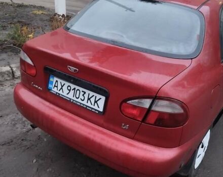 Красный ЗАЗ Ланос, объемом двигателя 1.4 л и пробегом 198 тыс. км за 1750 $, фото 3 на Automoto.ua
