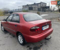 Красный ЗАЗ Ланос, объемом двигателя 1.39 л и пробегом 180 тыс. км за 1750 $, фото 5 на Automoto.ua