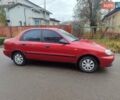 Красный ЗАЗ Ланос, объемом двигателя 1.39 л и пробегом 254 тыс. км за 1500 $, фото 4 на Automoto.ua