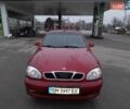 Красный ЗАЗ Ланос, объемом двигателя 1.39 л и пробегом 230 тыс. км за 2000 $, фото 1 на Automoto.ua