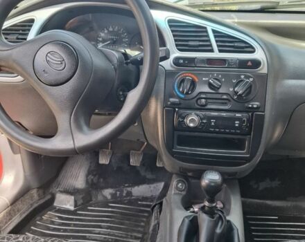 Червоний ЗАЗ Ланос, об'ємом двигуна 1.4 л та пробігом 150 тис. км за 1500 $, фото 2 на Automoto.ua