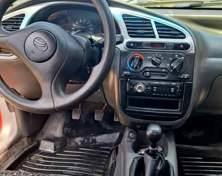 Червоний ЗАЗ Ланос, об'ємом двигуна 1.4 л та пробігом 100 тис. км за 1400 $, фото 6 на Automoto.ua