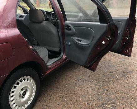 Красный ЗАЗ Ланос, объемом двигателя 1.6 л и пробегом 185 тыс. км за 2300 $, фото 5 на Automoto.ua