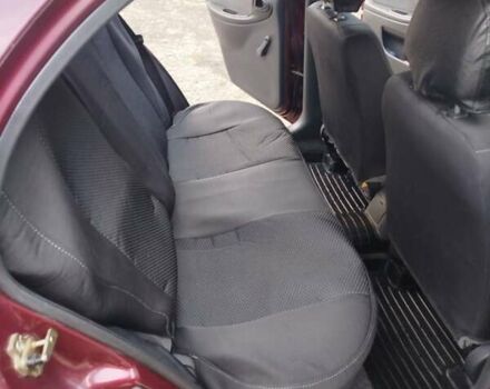 Красный ЗАЗ Ланос, объемом двигателя 1.6 л и пробегом 147 тыс. км за 2500 $, фото 5 на Automoto.ua