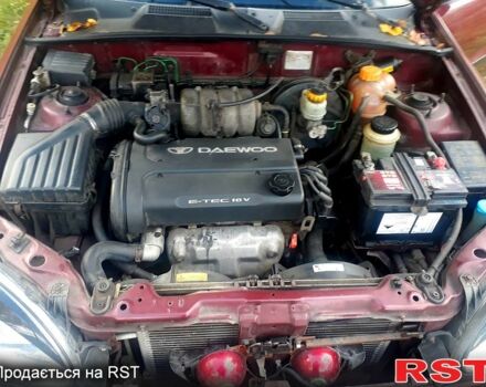 Червоний ЗАЗ Ланос, об'ємом двигуна 1.6 л та пробігом 227 тис. км за 2000 $, фото 6 на Automoto.ua