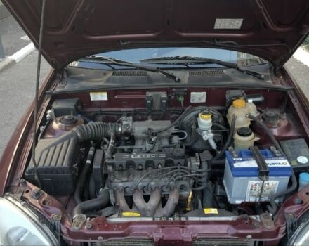 Красный ЗАЗ Ланос, объемом двигателя 1.5 л и пробегом 150 тыс. км за 2100 $, фото 6 на Automoto.ua