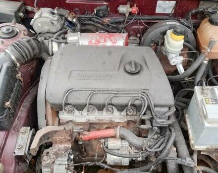 Красный ЗАЗ Ланос, объемом двигателя 1.39 л и пробегом 190 тыс. км за 1850 $, фото 9 на Automoto.ua