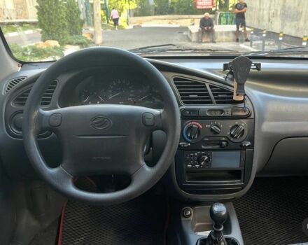 Красный ЗАЗ Ланос, объемом двигателя 1.5 л и пробегом 150 тыс. км за 2100 $, фото 5 на Automoto.ua