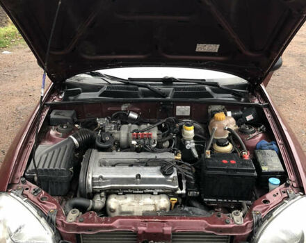 Красный ЗАЗ Ланос, объемом двигателя 1.6 л и пробегом 185 тыс. км за 2300 $, фото 6 на Automoto.ua