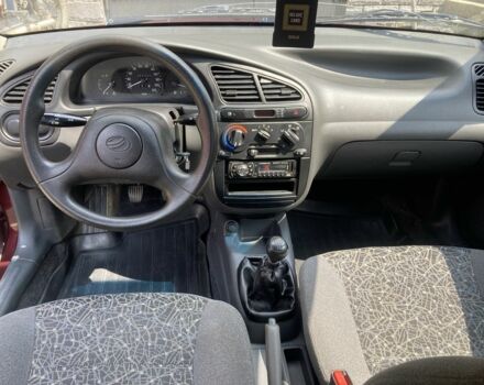 Красный ЗАЗ Ланос, объемом двигателя 1.5 л и пробегом 65 тыс. км за 3100 $, фото 6 на Automoto.ua