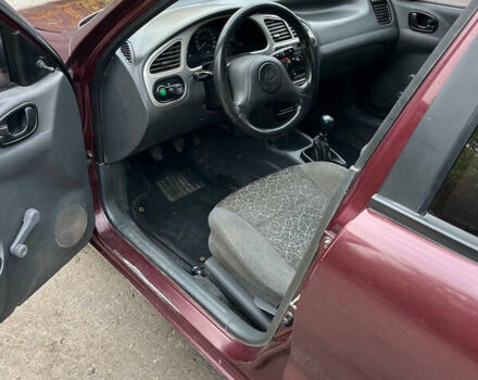 Красный ЗАЗ Ланос, объемом двигателя 1.39 л и пробегом 123 тыс. км за 3000 $, фото 8 на Automoto.ua