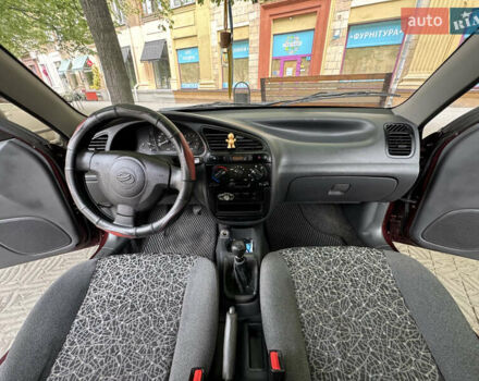 Красный ЗАЗ Ланос, объемом двигателя 1.5 л и пробегом 128 тыс. км за 3600 $, фото 6 на Automoto.ua