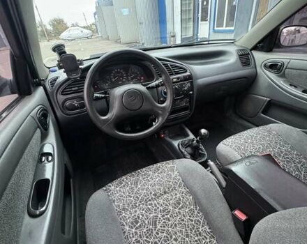 Красный ЗАЗ Ланос, объемом двигателя 1.5 л и пробегом 208 тыс. км за 3450 $, фото 8 на Automoto.ua