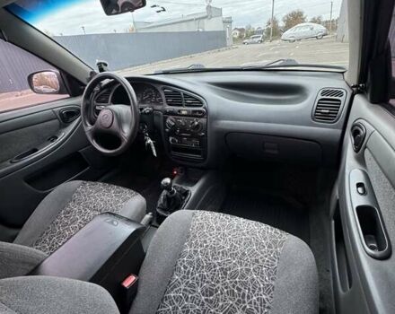 Красный ЗАЗ Ланос, объемом двигателя 1.5 л и пробегом 208 тыс. км за 3450 $, фото 10 на Automoto.ua