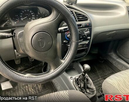 Красный ЗАЗ Ланос, объемом двигателя 1.5 л и пробегом 159 тыс. км за 3750 $, фото 4 на Automoto.ua