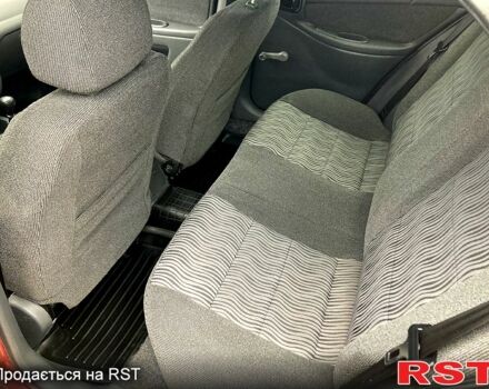 Красный ЗАЗ Ланос, объемом двигателя 1.5 л и пробегом 159 тыс. км за 3750 $, фото 6 на Automoto.ua