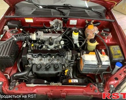 Красный ЗАЗ Ланос, объемом двигателя 1.5 л и пробегом 159 тыс. км за 3750 $, фото 3 на Automoto.ua