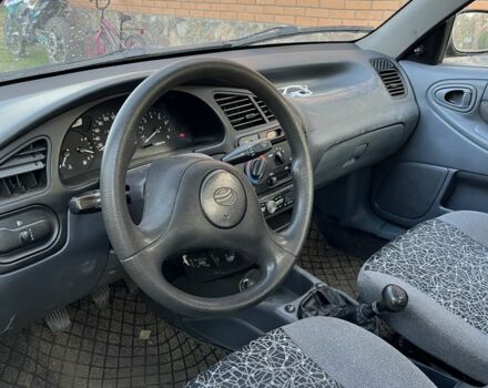 Красный ЗАЗ Ланос, объемом двигателя 1.5 л и пробегом 250 тыс. км за 1799 $, фото 1 на Automoto.ua