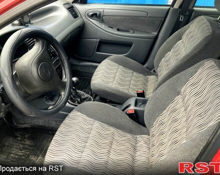 Красный ЗАЗ Ланос, объемом двигателя 1.5 л и пробегом 159 тыс. км за 3750 $, фото 5 на Automoto.ua