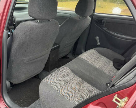 Красный ЗАЗ Ланос, объемом двигателя 1.5 л и пробегом 98 тыс. км за 3300 $, фото 14 на Automoto.ua