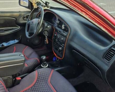 Красный ЗАЗ Ланос, объемом двигателя 1.5 л и пробегом 144 тыс. км за 2500 $, фото 12 на Automoto.ua