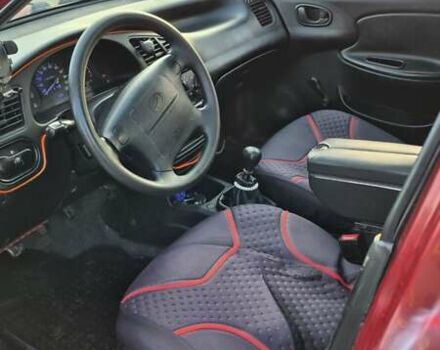 Красный ЗАЗ Ланос, объемом двигателя 1.5 л и пробегом 144 тыс. км за 2500 $, фото 8 на Automoto.ua