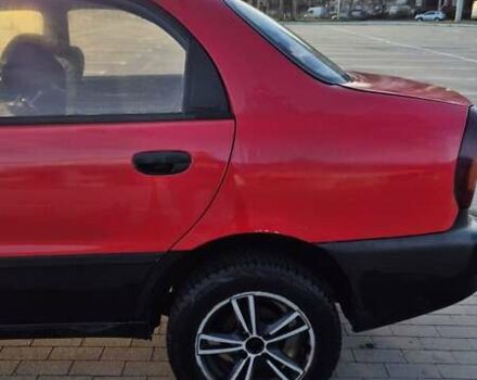 Красный ЗАЗ Ланос, объемом двигателя 1.5 л и пробегом 144 тыс. км за 2500 $, фото 2 на Automoto.ua