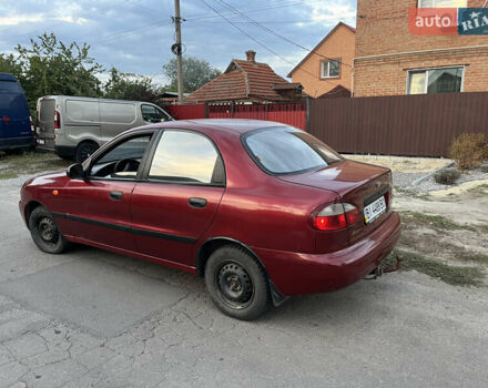Красный ЗАЗ Ланос, объемом двигателя 1.39 л и пробегом 218 тыс. км за 1700 $, фото 1 на Automoto.ua