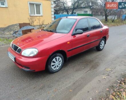 Красный ЗАЗ Ланос, объемом двигателя 1.39 л и пробегом 254 тыс. км за 1500 $, фото 1 на Automoto.ua