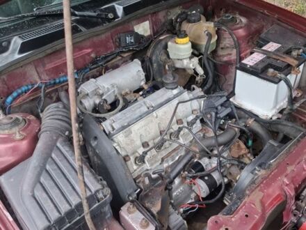 Красный ЗАЗ Ланос, объемом двигателя 1.4 л и пробегом 150 тыс. км за 1500 $, фото 1 на Automoto.ua