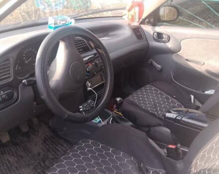 Жовтий ЗАЗ Ланос, об'ємом двигуна 1.39 л та пробігом 300 тис. км за 1350 $, фото 3 на Automoto.ua